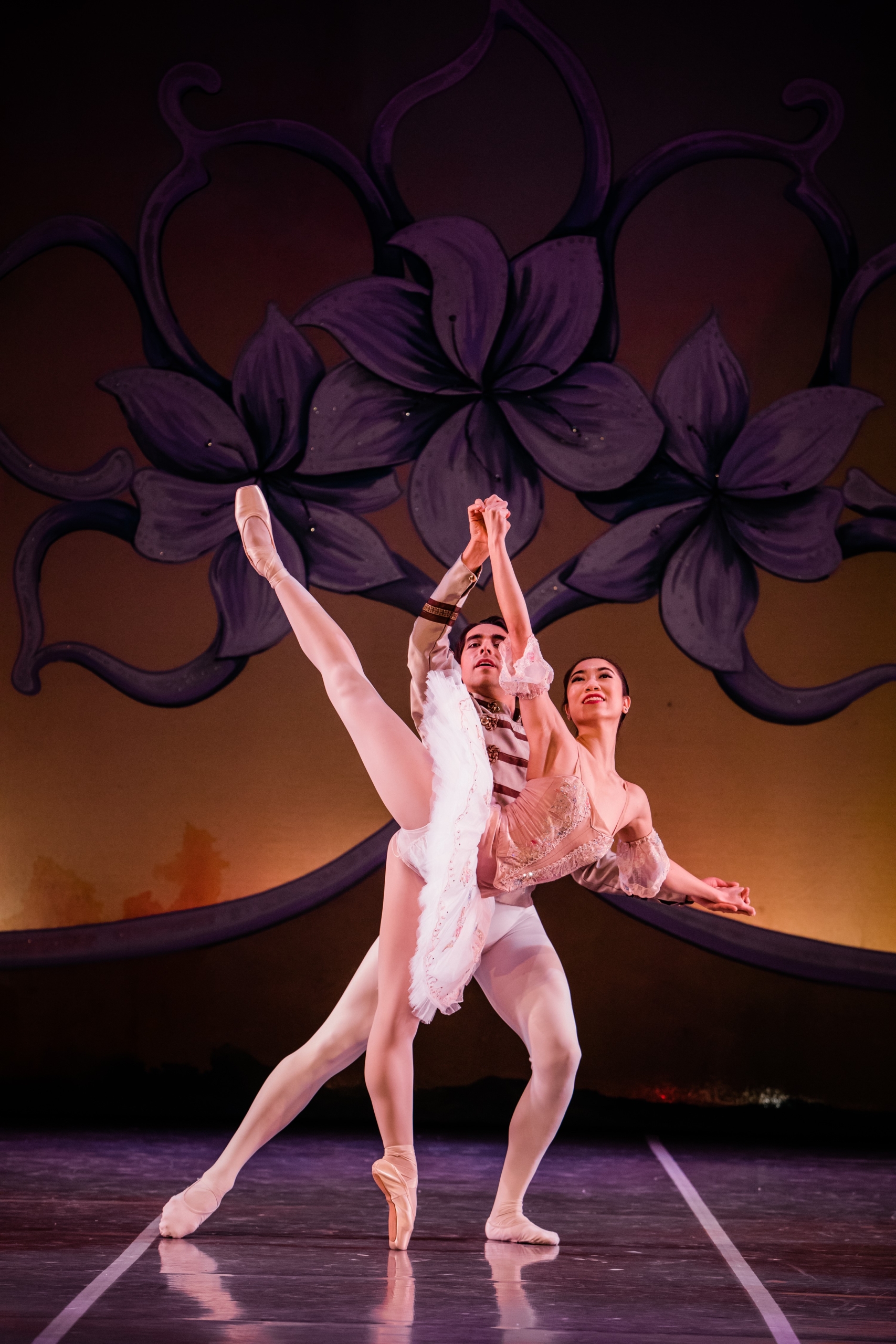 Nutcracker ballet - a male and female dancer looking up