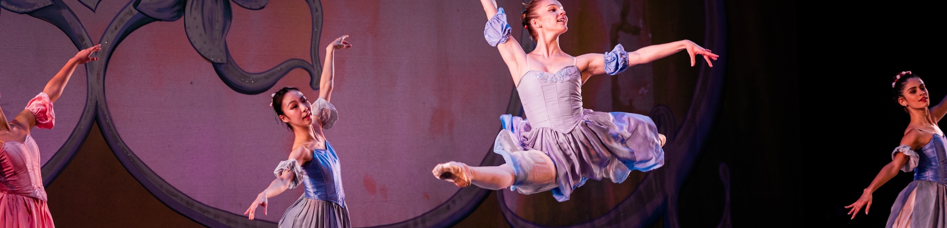 A group of ballet dancers on stage