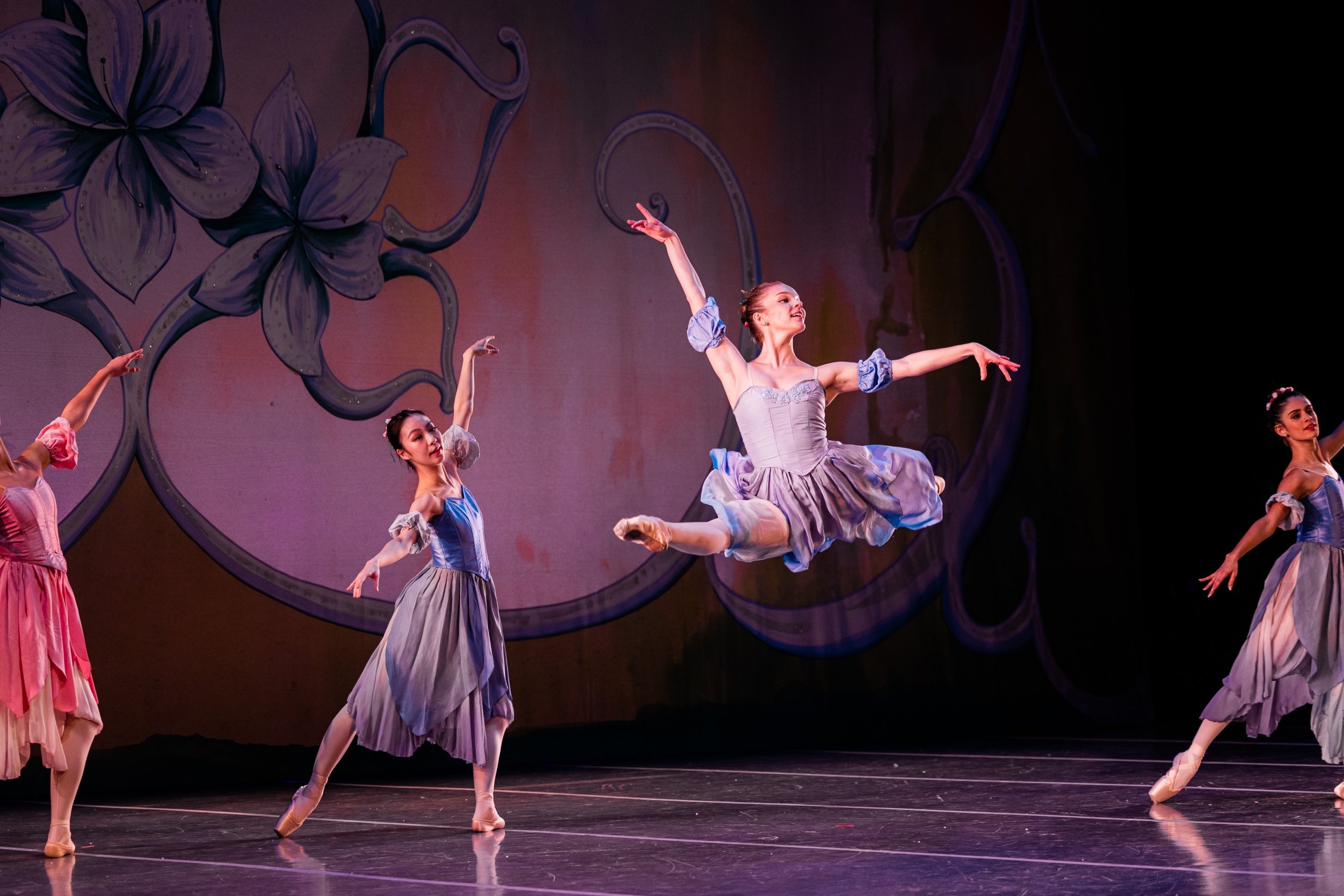 A group of ballet dancers on stage